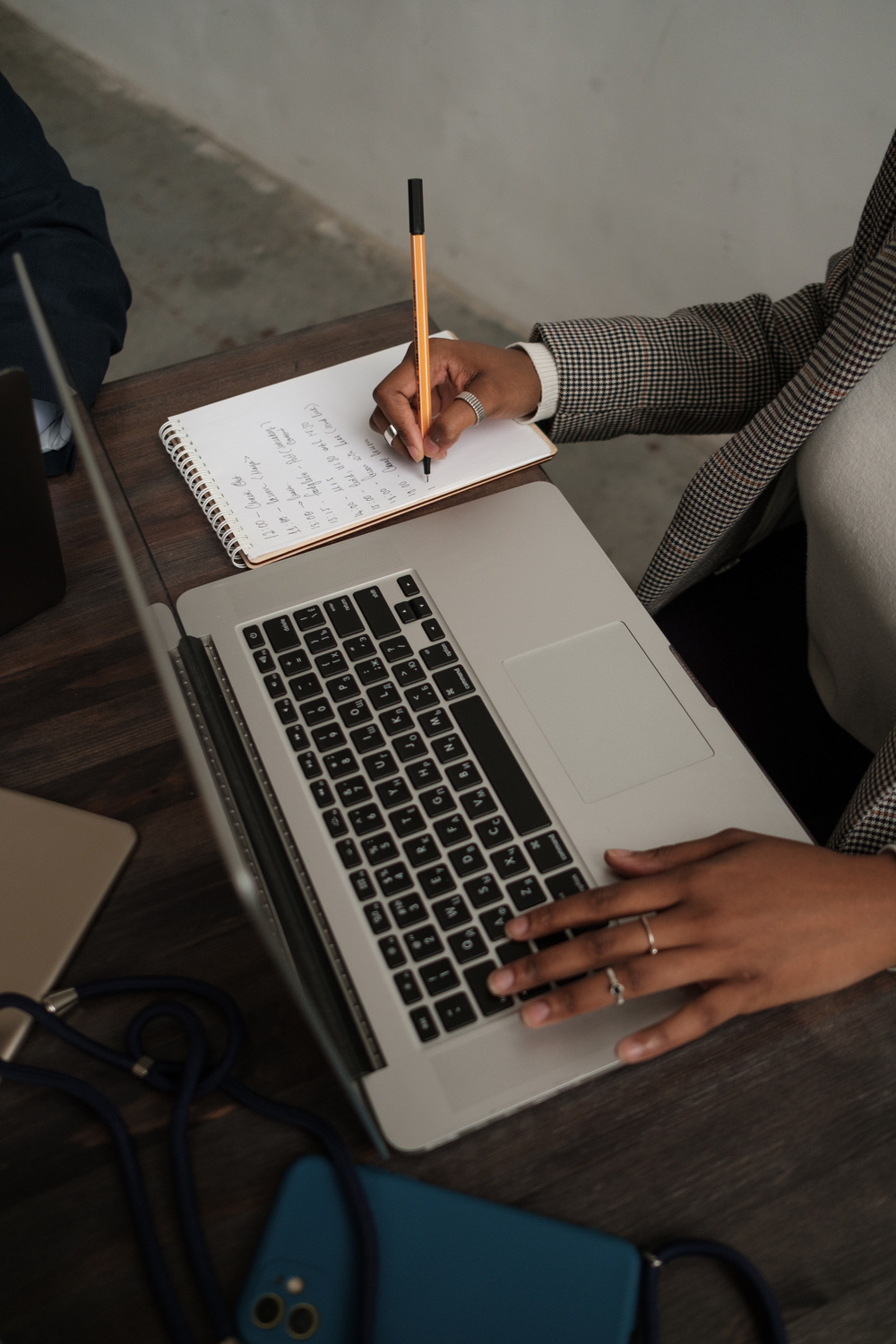 Woman Writing Notes at Work